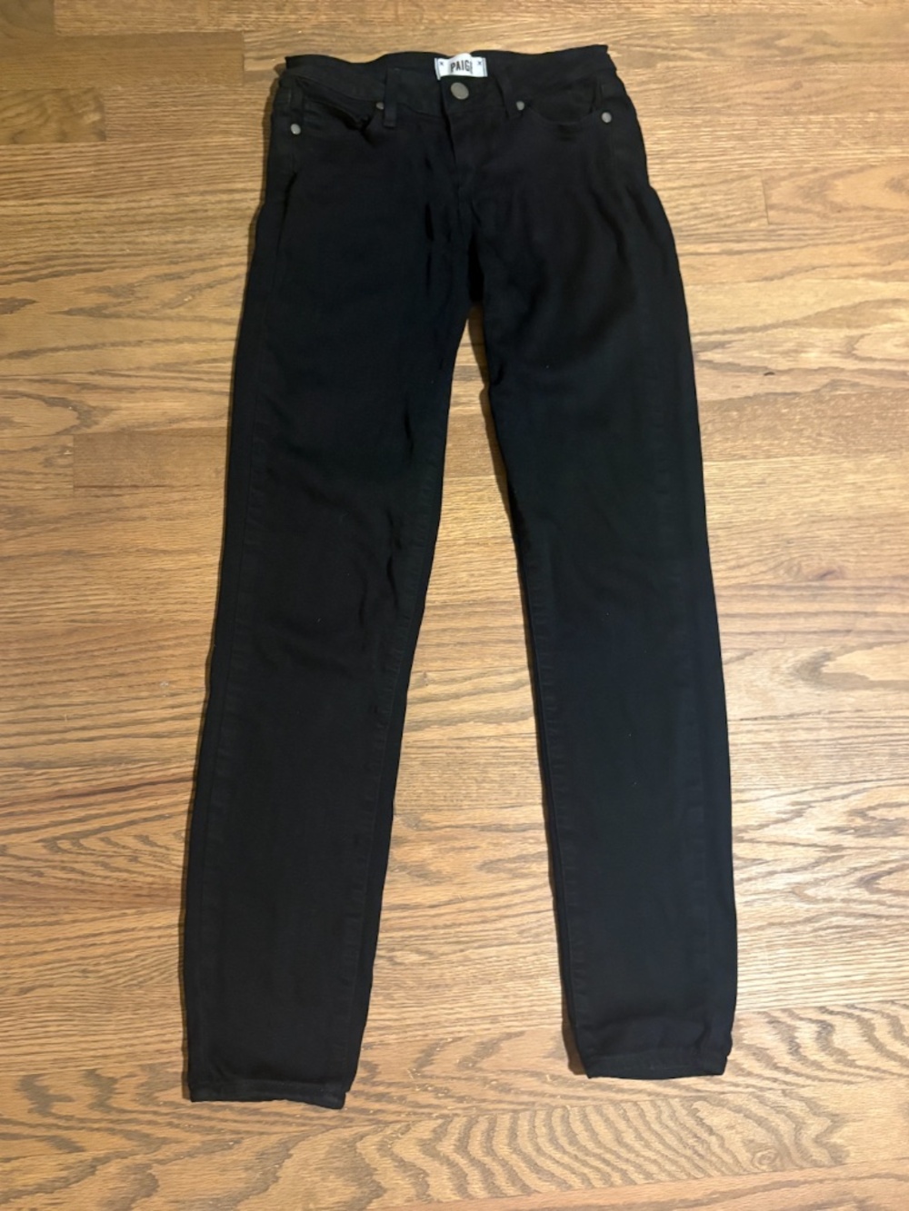Paige Mid Rise Skinny Jeans in Black
